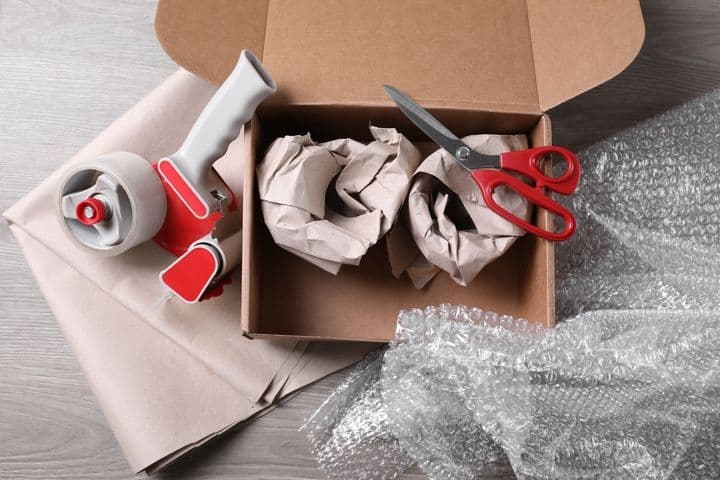 Save money on packing materials by repurposing household items, sourcing free supplies, and strategically purchasing affordable packing essentials.